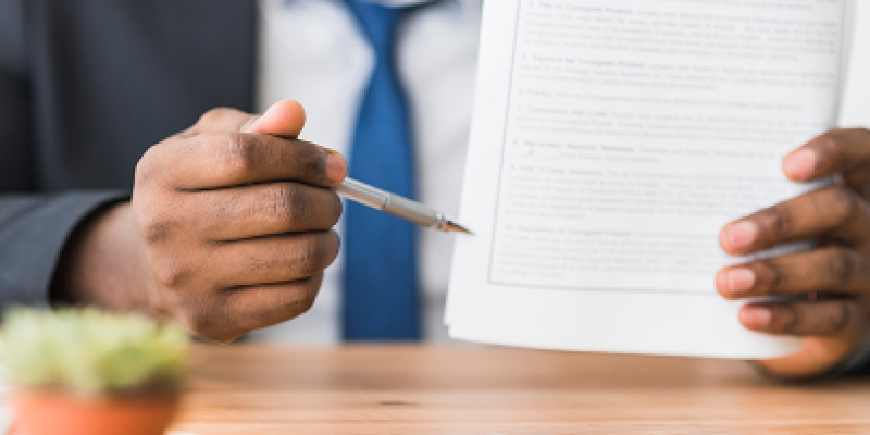 Man showing papers